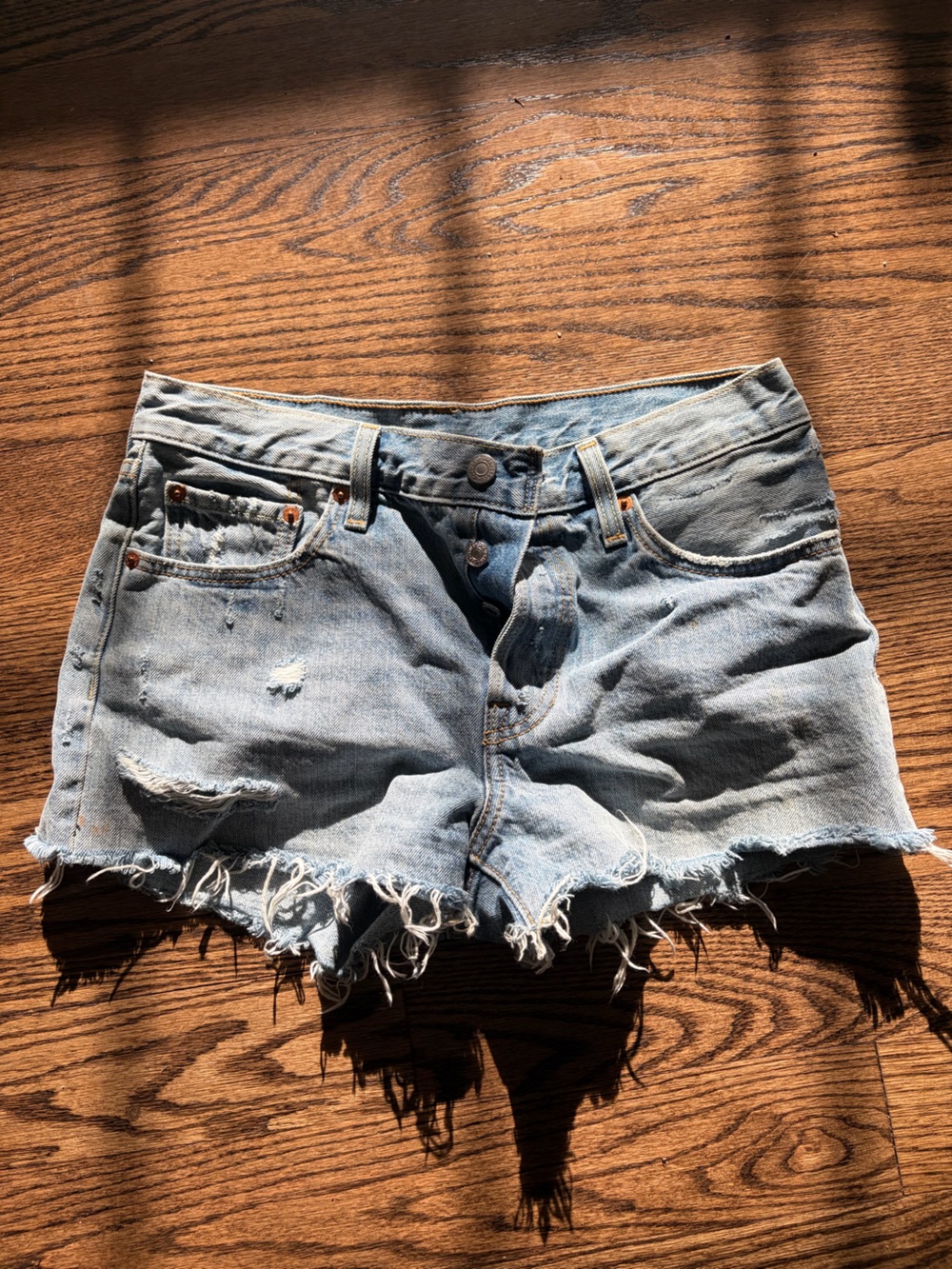 Low-Rise Distressed Denim Cutoff Shorts - Light Blue